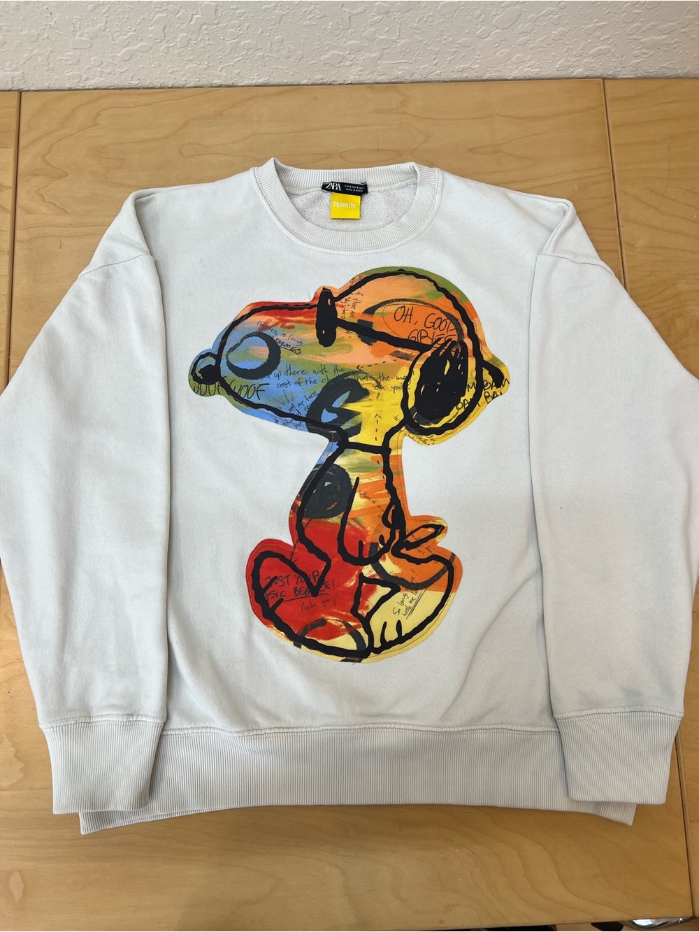 Zara White Sweatshirt in size S with Multicolor Snoopy Graphic